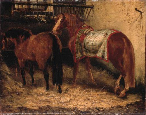 Dois cavalos em um estábulo