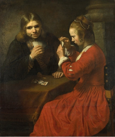 Um jovem e uma menina jogando cartas